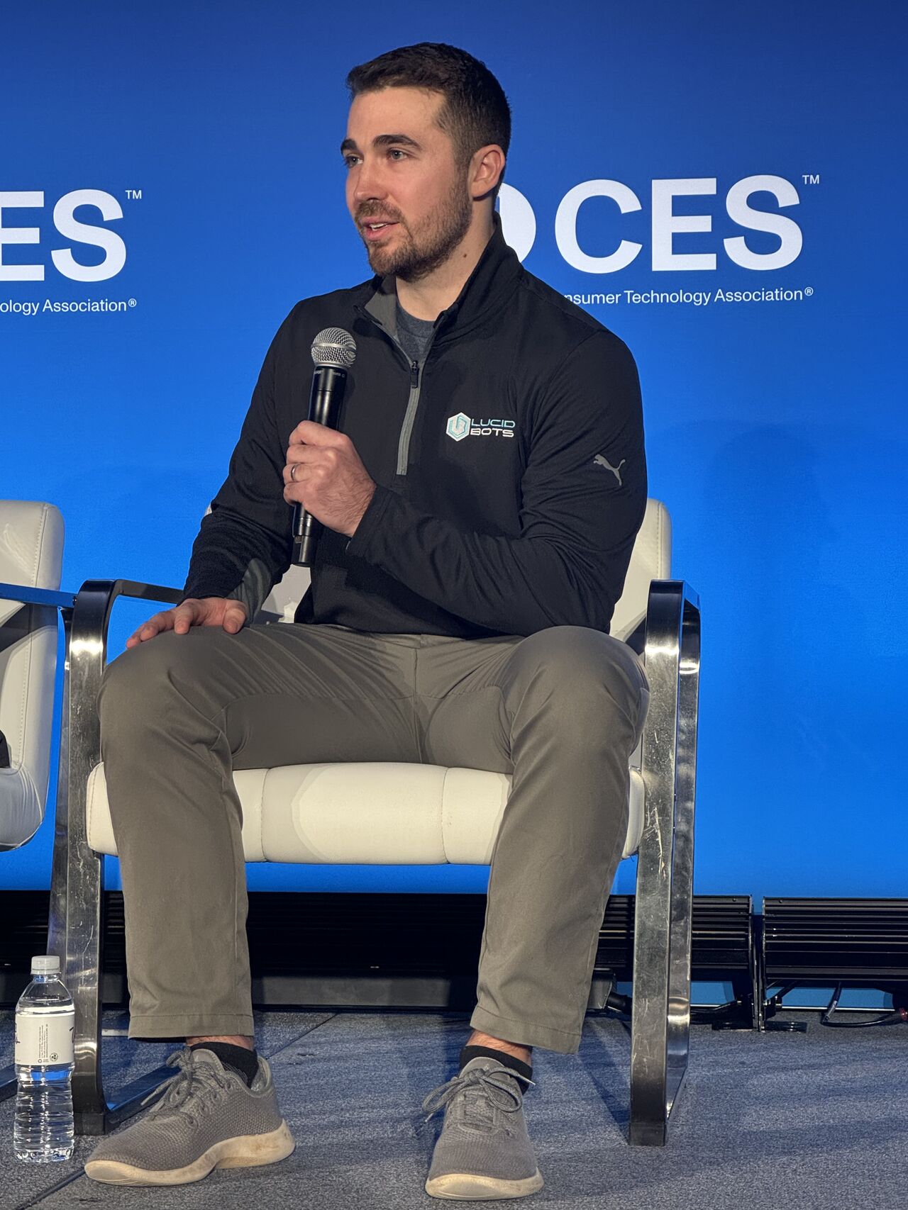 Andrew Ashur, Founder and CEO of Lucid Bots, speaking on stage at CES